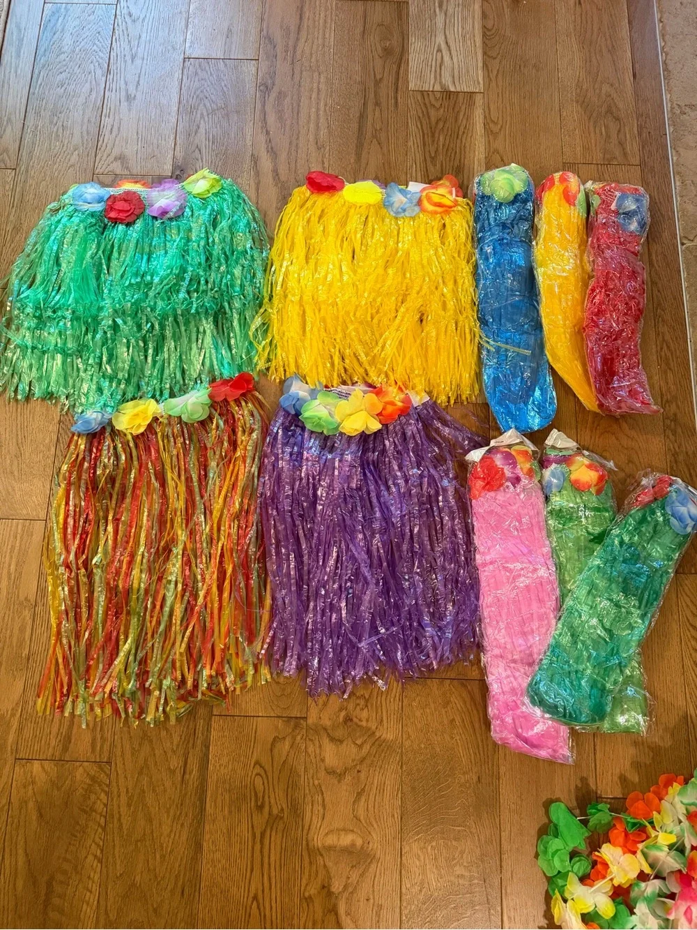 Kids Hawaiian Leis and grass skirts party favors